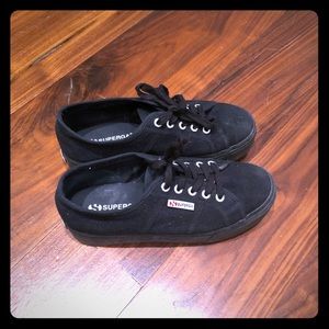 All black platform sneakers